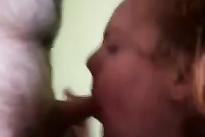Drilling a redhead fattie's snatch from behind in homemade movie