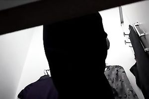 Caught on hidden livecam movie in the changing room wearing pants