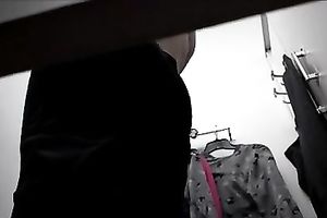 Caught on hidden livecam movie in the changing room wearing pants