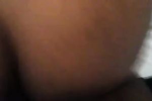 This skanky nympho with big black wazoo likes getting pounded from behind