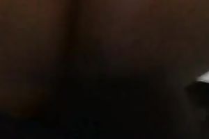 This skanky nympho with big black wazoo likes getting pounded from behind