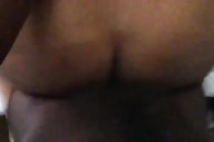 This skanky nympho with big black wazoo likes getting pounded from behind