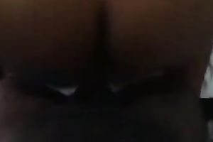 This skanky nympho with big black wazoo likes getting pounded from behind