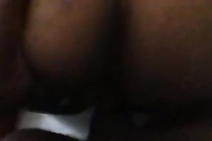 This skanky nympho with big black wazoo likes getting pounded from behind