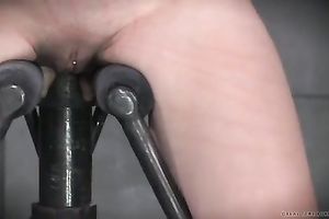 Hot and busty serf gets her vagina fucked with an automatic metallic device