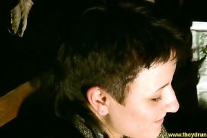 This short haired skank with a nice tatttoo on her back prefers being topless