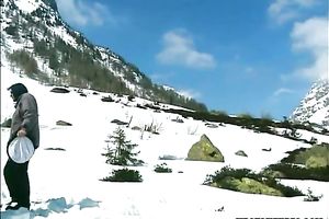 Dissolute golden-haired beauty gives oral-stimulation in the mountains