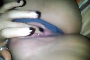 My cute GF entertains herself by fingering her bald muff