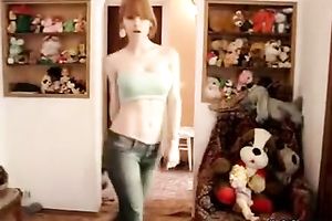 Homemade solo with a cute redhead sweetheart dancing seductively