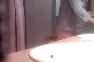 Spying on my toothless black cock sluts peeing in the washroom