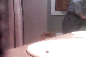 Spying on my toothless black cock sluts peeing in the washroom