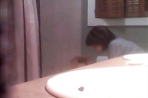 Spying on my toothless black cock sluts peeing in the washroom