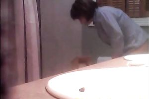 Spying on my toothless black cock sluts peeing in the washroom