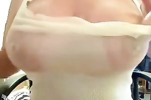 Outstanding saggies shown in the constricted white blouse