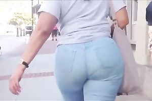This bootylicious woman has no idea I am following her