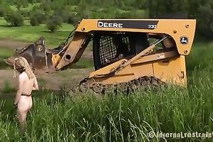 Breath taking golden-haired slut sitting on the twine is toyed