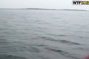 Amateur brunette hair smokes on a yacht and gives a priceless oral