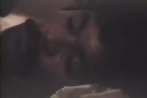 Hot slut gets her bushy cookie fingered in retro sex video