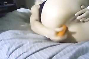 I am sliding a candle in and out of me in front of a camera