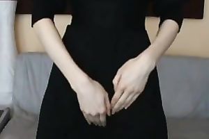 Beautiful woman demonstrates her cleavage for the webcam