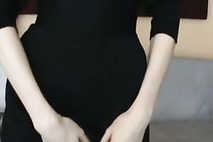 Beautiful woman demonstrates her cleavage for the webcam