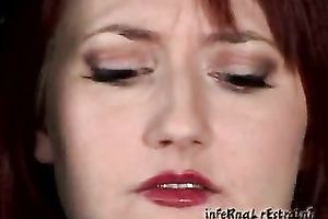 Redhead milf acquires her snatch smashed with a sextoy in BDSM movie