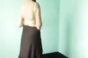 Petite non-professional Indian wife stripteases on intimate movie