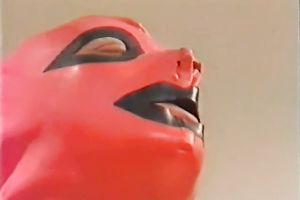 Classic playgirl gives oral-sex to one weird fellow in latex mask