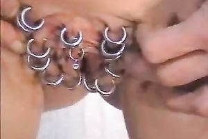 My titless brunette hair GF demonstrates her pierced bawdy cleft for the webcam