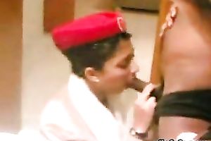 Petite Asian stewardess gives blowjob to her fuckbuddy in hotel