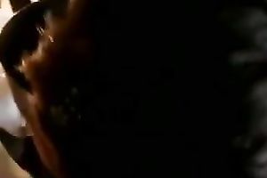 Skanky gal with tattoos shows off her pecker engulfing skills