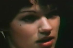 Two concupiscent brunettes toying shaggy wet cracks during the time that watching TV