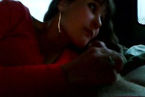 My dark-haired paramour sucks my dong ardently in a car