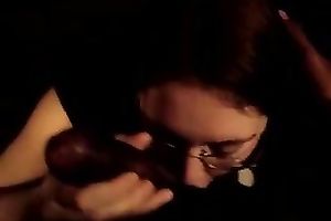 Next-door hussy wearing glasses sucks my dark boner in POV clip
