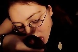 Next-door hussy wearing glasses sucks my dark boner in POV clip