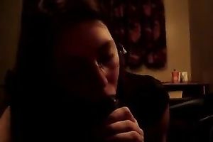Next-door hussy wearing glasses sucks my dark boner in POV clip