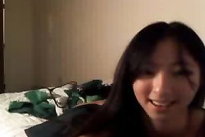 Cute Asian dark brown legal age teenager stripteasing on livecam and playing