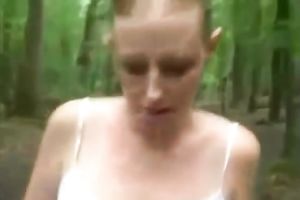 Skinny hussy sucks a chunky schlong outdoors and acquires facialed