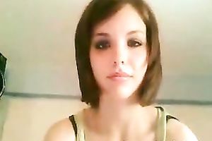 Lovely brunette hair ten rubs her pink muff with her fingers