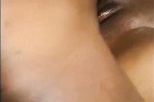 Black wench receives a hard jizz flow on her face which looks like snot