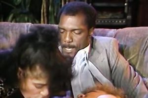 Three concupiscent harlots taking care of a large dark weenie