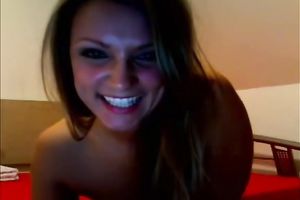 Tattooed blond teen fingers her wet crack in front of a webcam