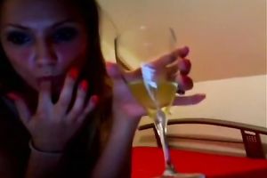 Tattooed blond teen fingers her wet crack in front of a webcam