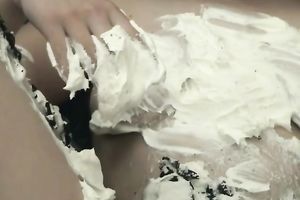 Brown-haired floozy decorates her body with whipped jizz