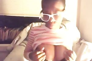 Amateur swarthy sweetheart kneads her love bubbles in web camera solo scene