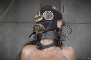 Nasty dark brown mama in mask is toyed well and spanked