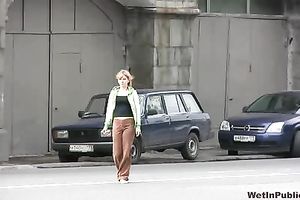 Lewd honey Sveta doesn't mind to pee in the street