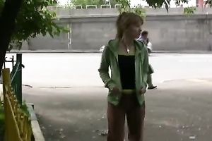 Lewd honey Sveta doesn't mind to pee in the street