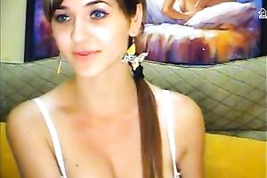 Bosomy cutie with charming eyes shows off her whoppers and cum-hole