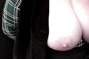 Amateur redhead doesn't mind to flash her large boobs in the street